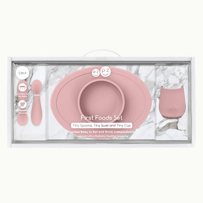 ezpz first foods set packaging (with tiny spoons, tiny bowl and tiny cup) in blush 