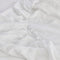 zoomed in on botana hemp crib sheet in white