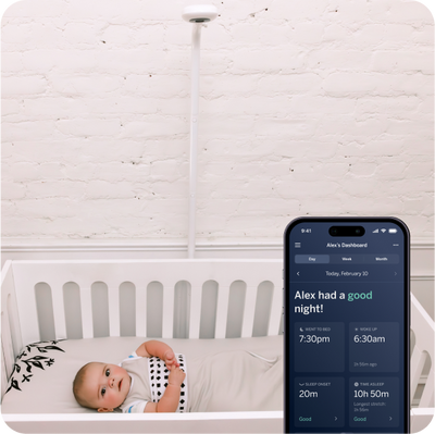 child in crib wearing nanit breathing band with mobile app display with sleep data