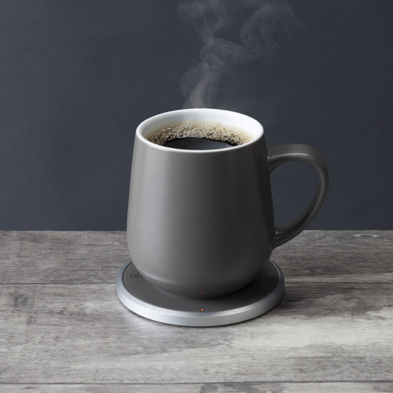 OHOM's UI Mug: This Self-Heating Ceramic Mug and Warmer Set Keeps Your  Drink Hot and Phone Charged