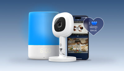 blue sound + light, baby monitor + flex stand, and nanit app showing split screen livestream with heart dotwhack saying "I heart heart sleep sale"