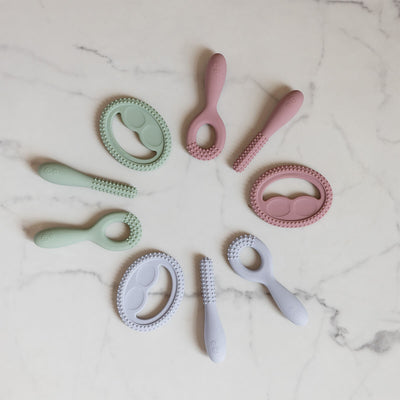 birds eye view of ezpz loop, smile, and stick tools in sage, blush, and pewter