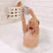 toddler playing with lalo stacking cups in bathtub