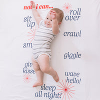 baby laying on nanit milestone blanket