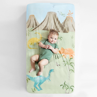 Baby laying on Rookie Humans jurassic sheet #color_jurassic